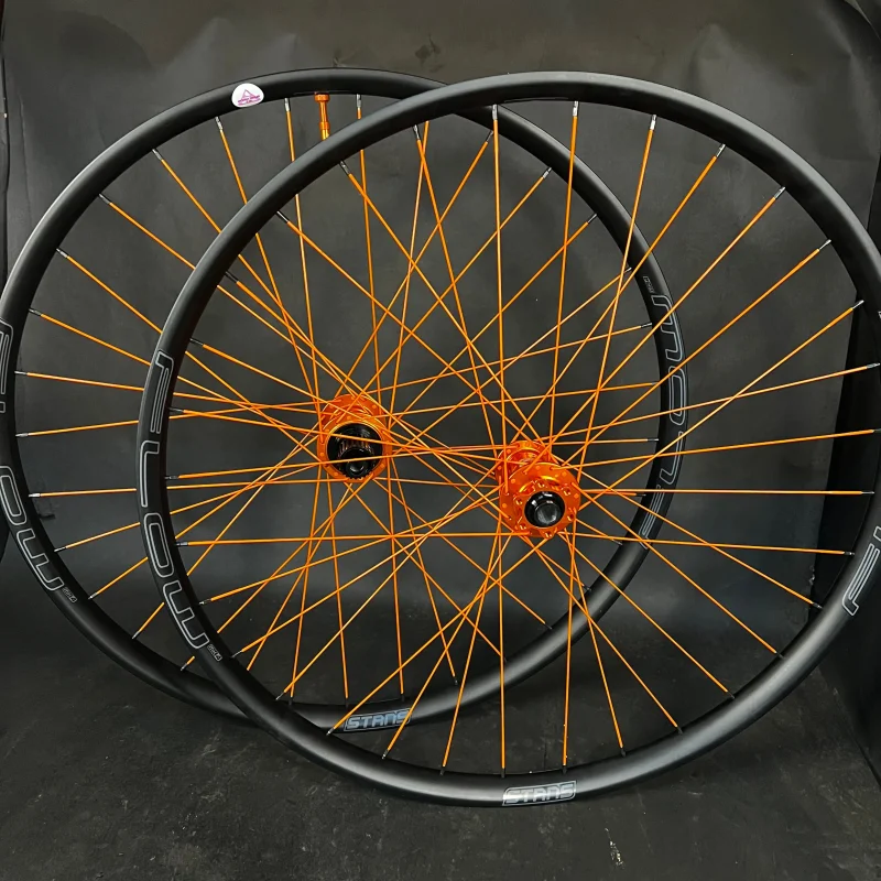 Trail: Full Orange Flow MK4 rims W/ Hydra 2 Boost hubs